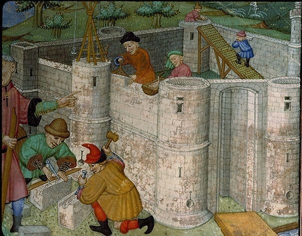 medieval workers building castle