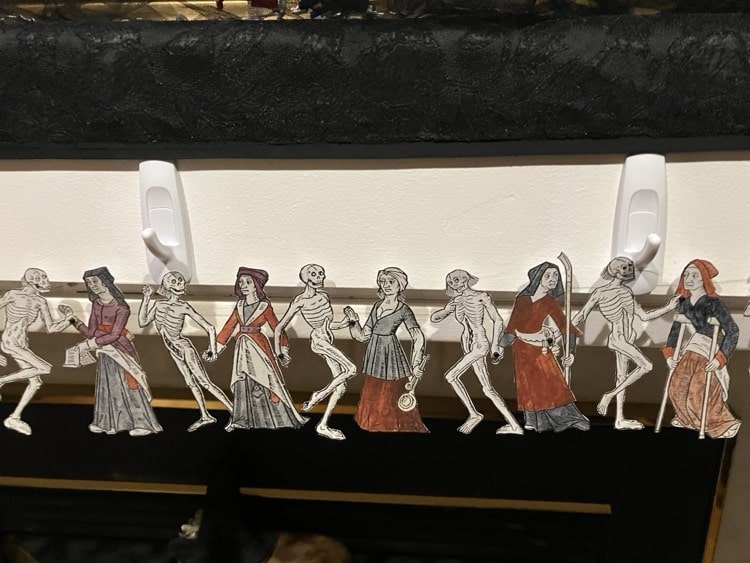 Lower class women dancing with skeletons